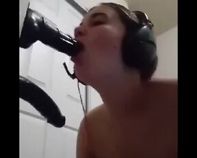 Gamer Girl Sucking on her Big Fat Black Dildos