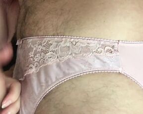 Jerked off wearing her pink panties