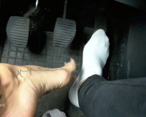 Hot Little Feet Tease On A Car Dashboard Preview