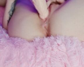 Cute girl fucks pussy with dildo close up