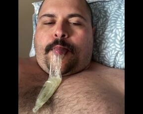 BigBullBoss playing with a condom full of cum found at the gym.