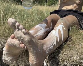 Smashing a cake with my feet. The chocolate and cream gateaux feels so nice between my toes