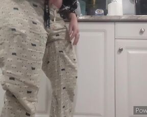 Desperate Wife Soaks Pants While Doing Dishes