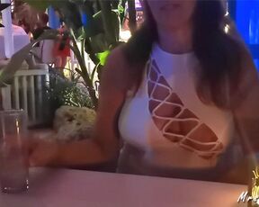 Milf in bar has big tit exposed, nipple in plain sight